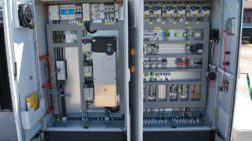 An open control box of a biogas plant with various interfaces